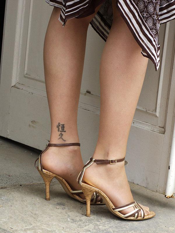 183730-600x800-asian-script-ankle-tattoo