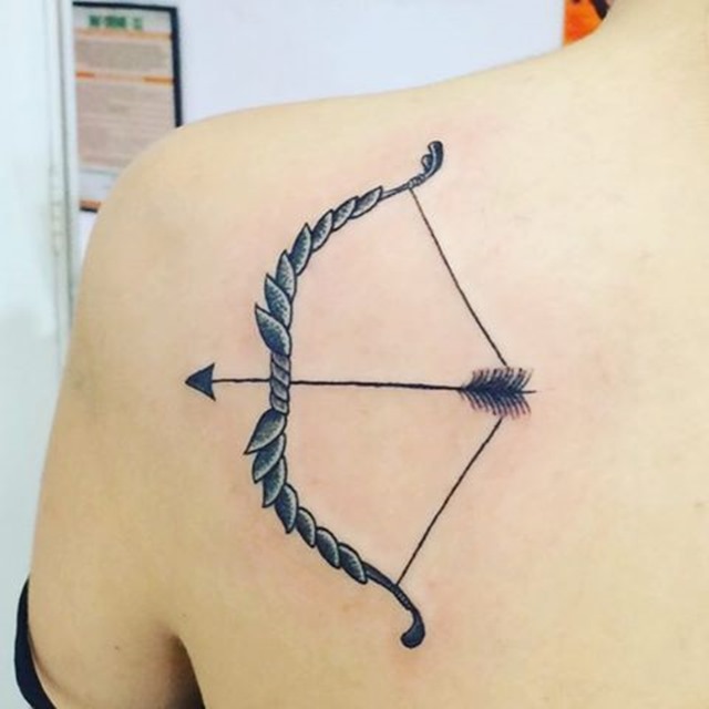 bow-and-arrow-girl-tattoo