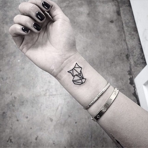 geometric-tiny-fox-tattoo-design-on-wrist