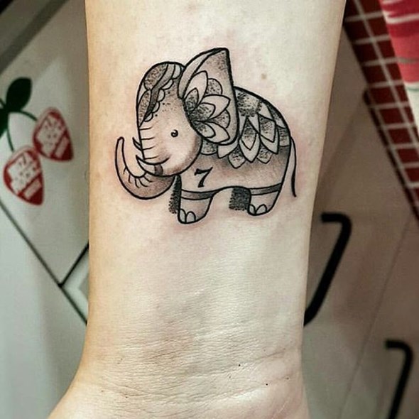 little-elephant-tattoo-on-wrist