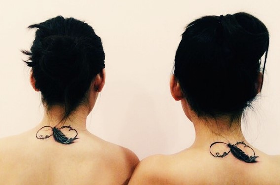 matching-sisters-infinity-feather-tattoo-on-back