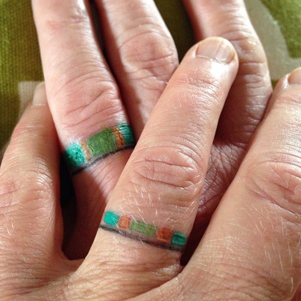matching-wedding-ring-finger-tattoos