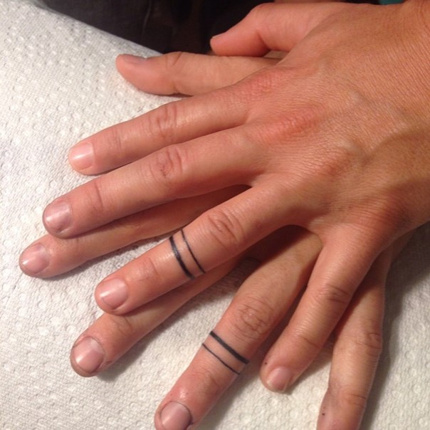 ring-finger-wedding-band-tattoos