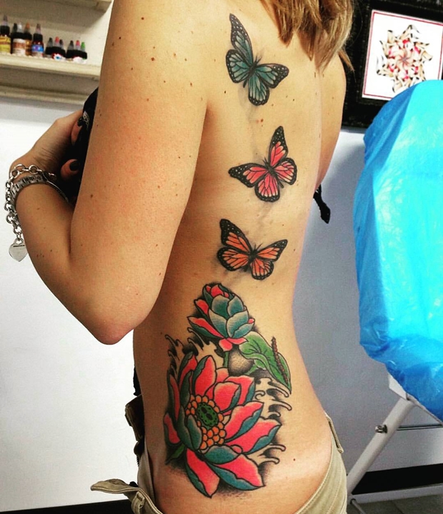 side-tattoos-female-butterflies