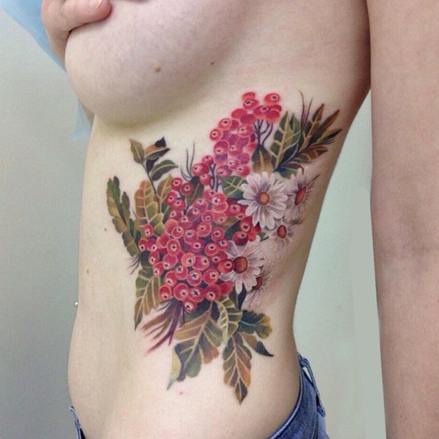 side-tattoos-female-flowers