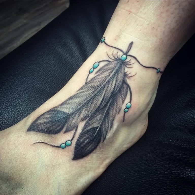 feather-tattoos-on-feet-768x768