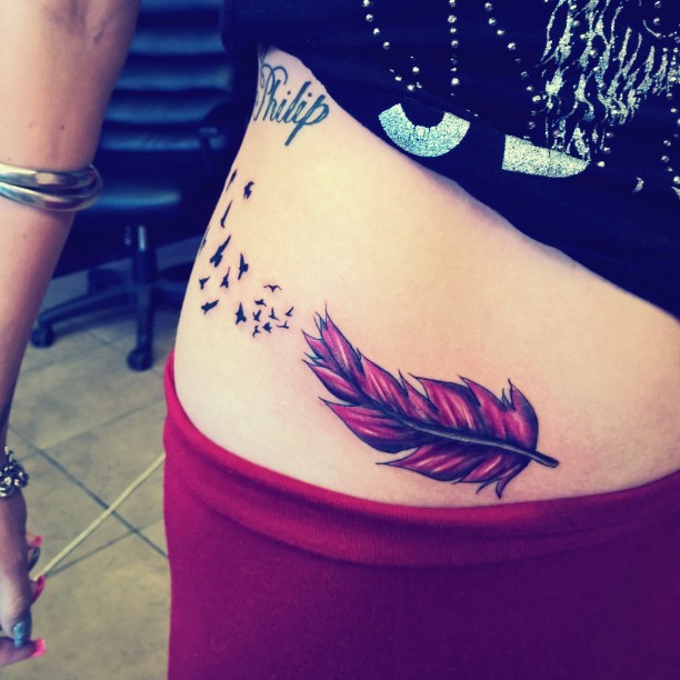 girly-cute-feather-tattoos