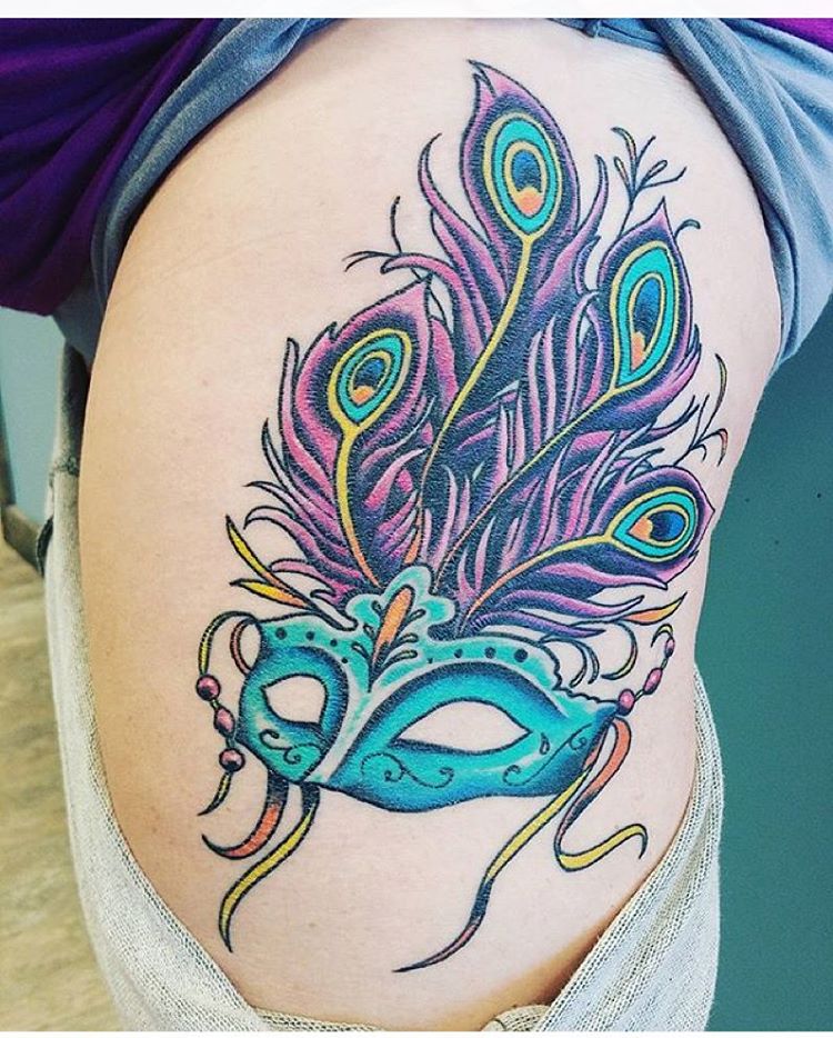 peacock-feather-tattoo-on-ribs