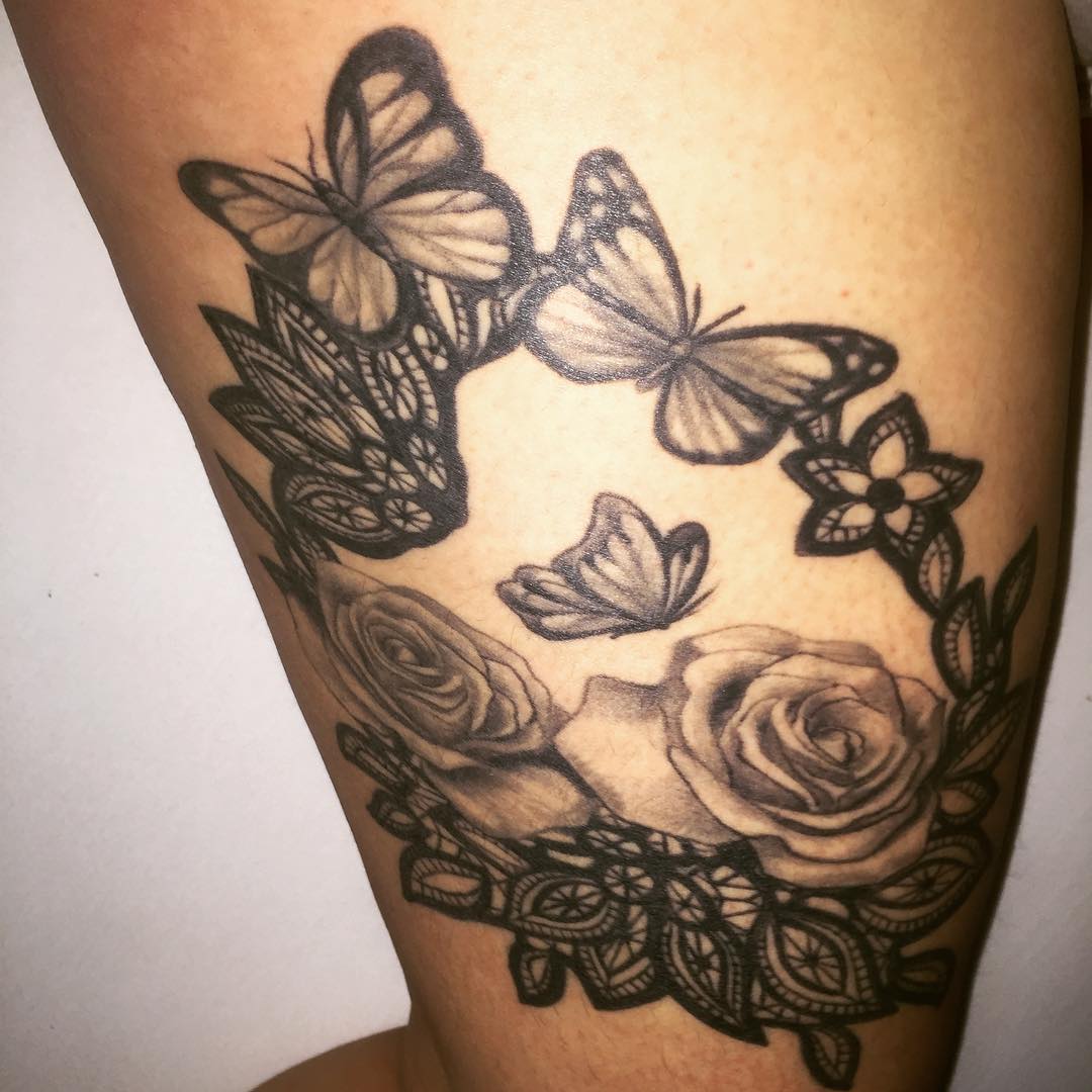 rose-flower-and-butterfly-tattoo-on-thight