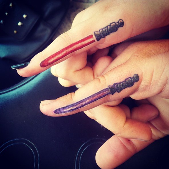 brother-and-sister-lightsaber-tattoo-finger