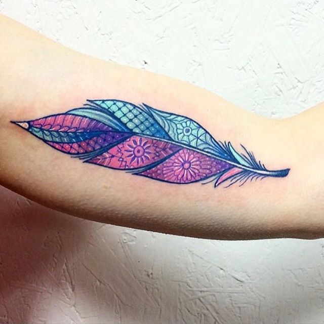 colorfull-feather-tattoo-designs-on-outer-arm