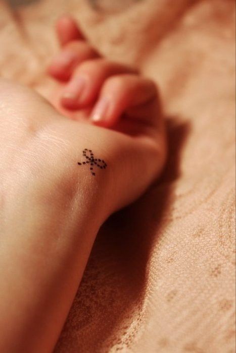 dotted-bow-tattoo
