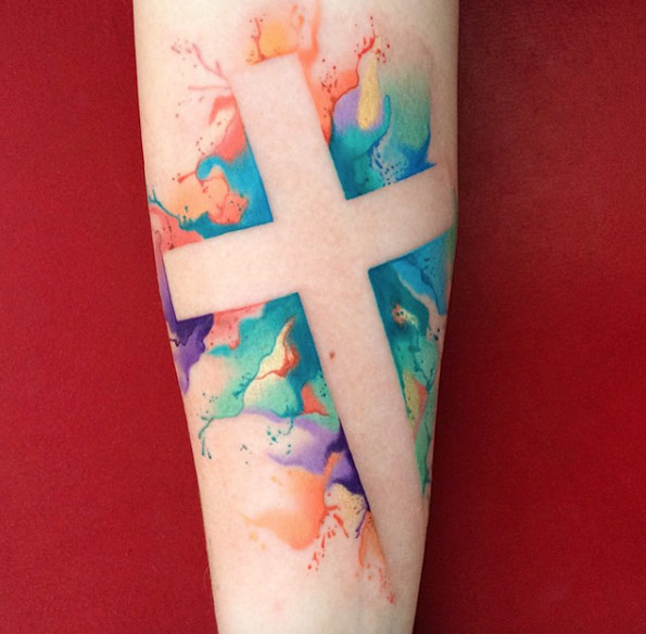 negative-space-cross-tattoo