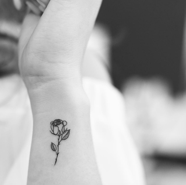 tiny-blackwork-rose-tattoo