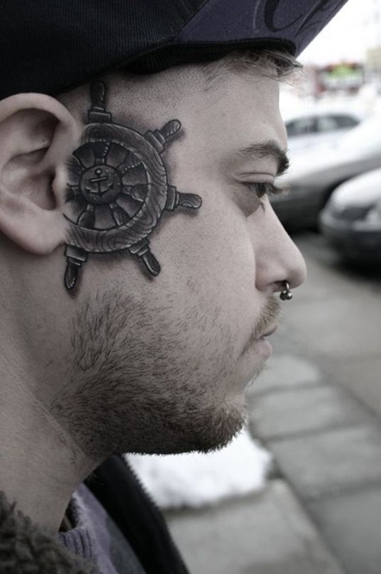 a-ships-wheel-face-tattoo1
