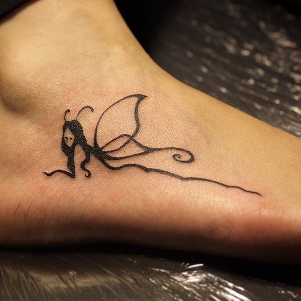 elegant_fairy_black_ink_tattoo_on_foot