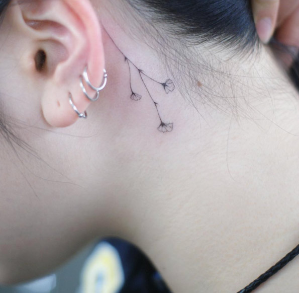 flowers-behind-ear-tattoo