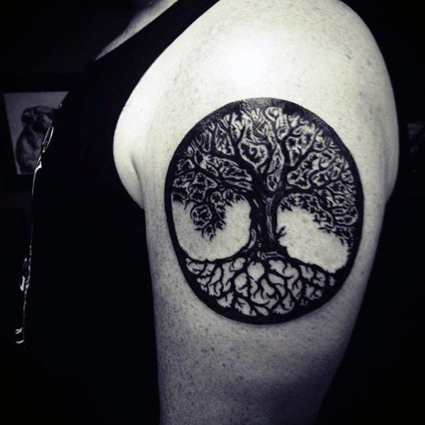 masculine-tree-of-life-guys-upper-arm-black-ink-tattoo-design-inspiration