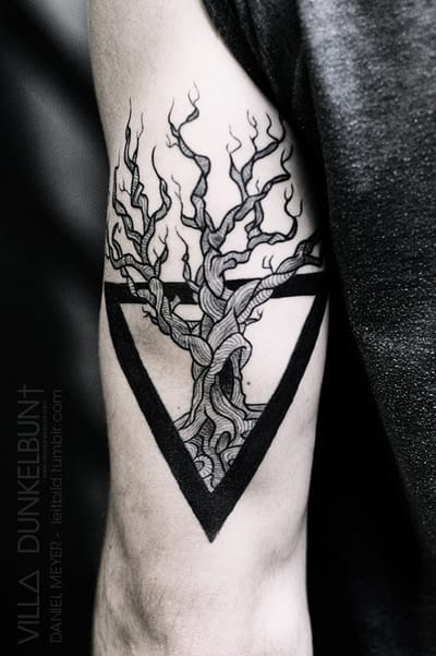 tree-without-leaves-in-triangle-tattoo-on-bicep
