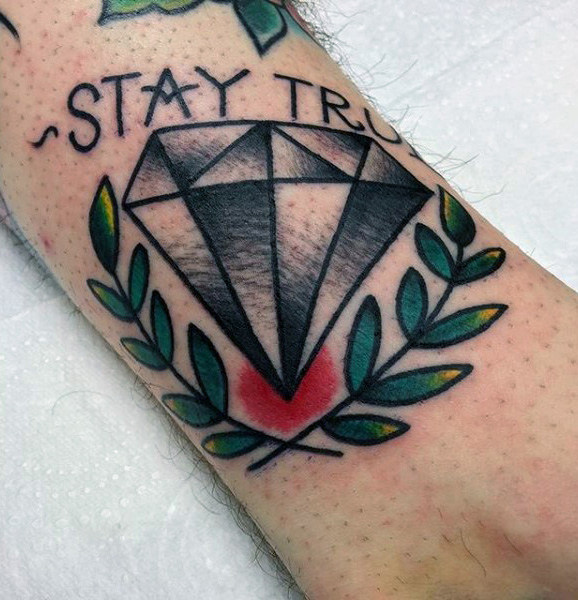 small-simple-old-school-male-stay-true-diamond-tattoo-with-olive-branches-on-arm