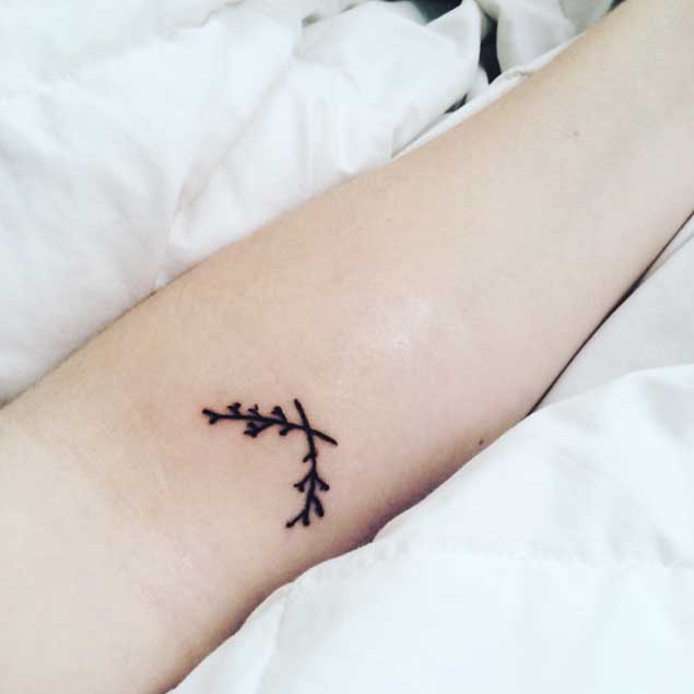 crossed-branches-tattoo